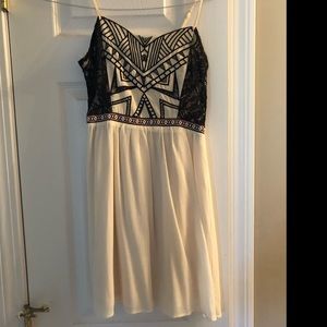 Cream and black dress